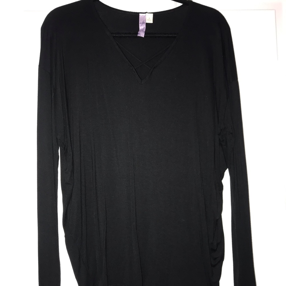 Black blouse, criss cross in the front